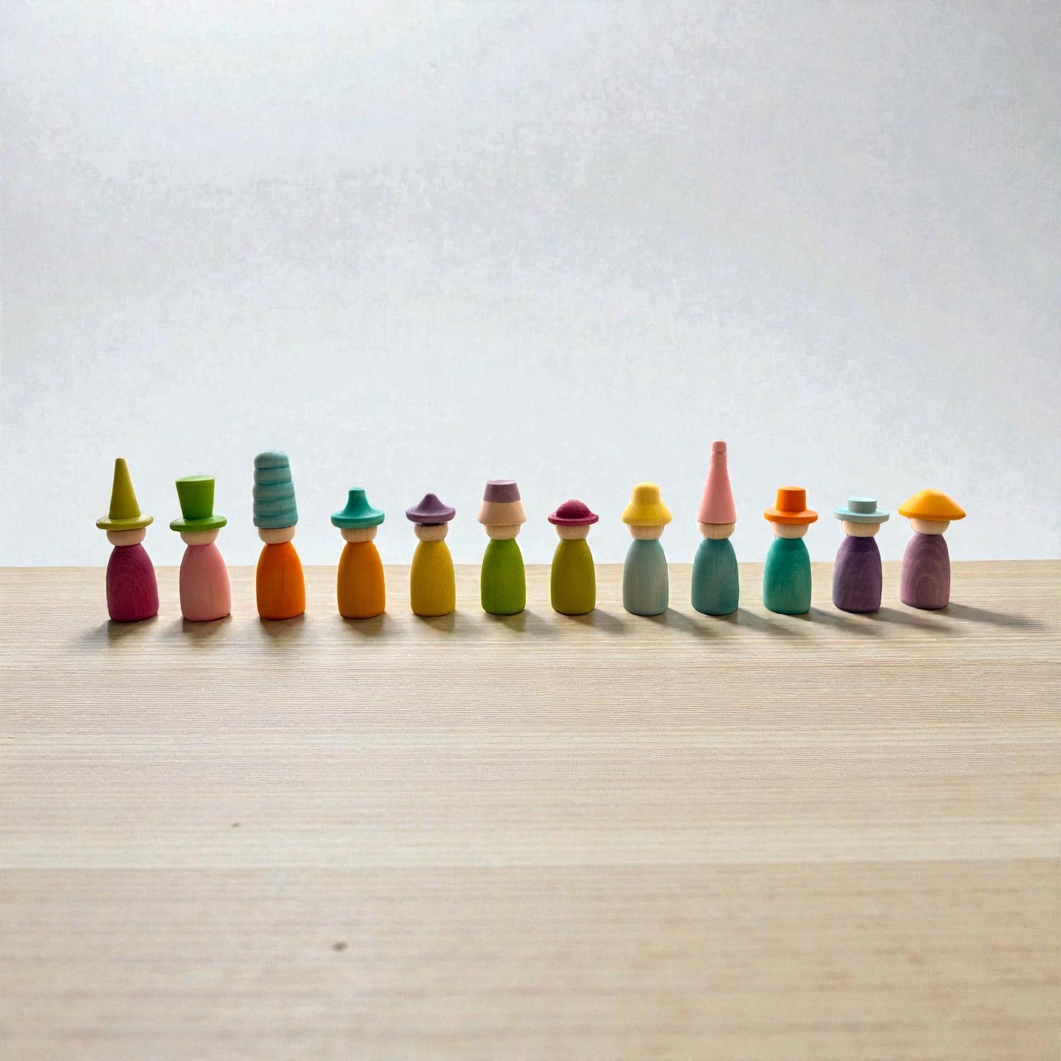 **Pre-order (Ships in 2-3 Weeks)**12 Piece Pastel Macaron Wooden Peg Dolls with Interchangeable Hats Open Ended Play Figures